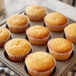 What is a good egg substitute for gluten-free cupcakes? Bowl of flax egg, chia seeds, and applesauce next to cupcake batter.